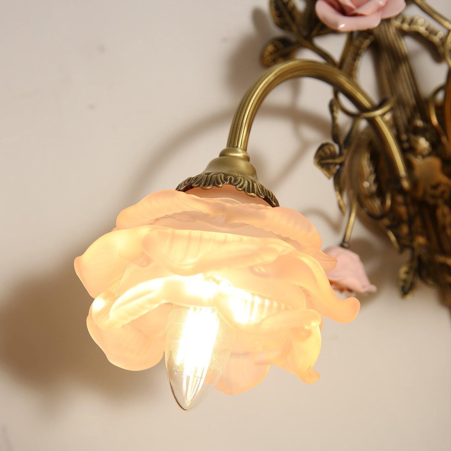 Top-down view of the Rosalie sconce's glass flower shades.