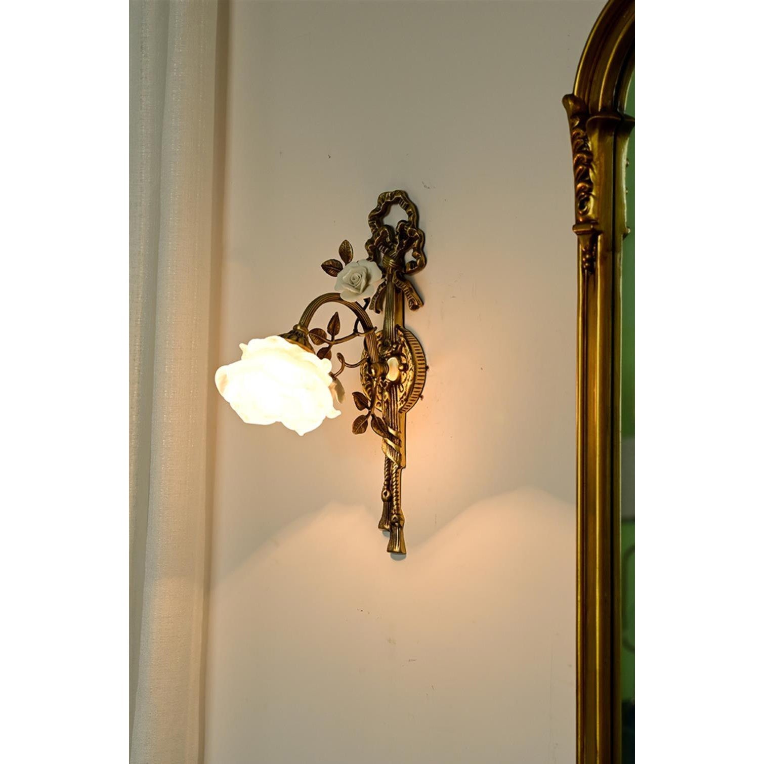Rosalie Floral Wall Lamp in a bedroom setting.