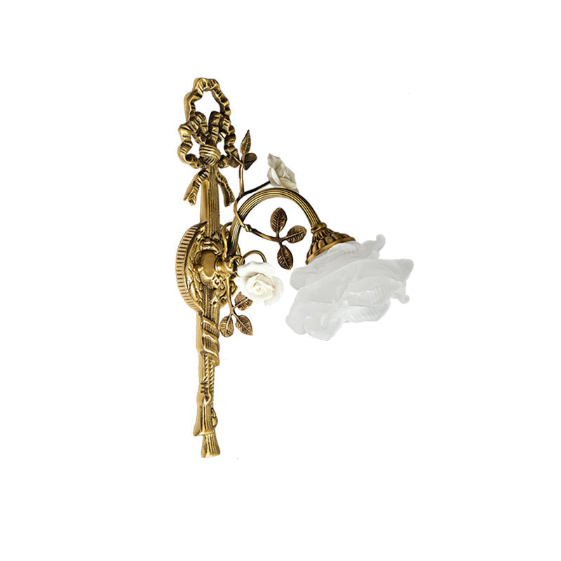 The elegant curve of the lamp's brass arm.
