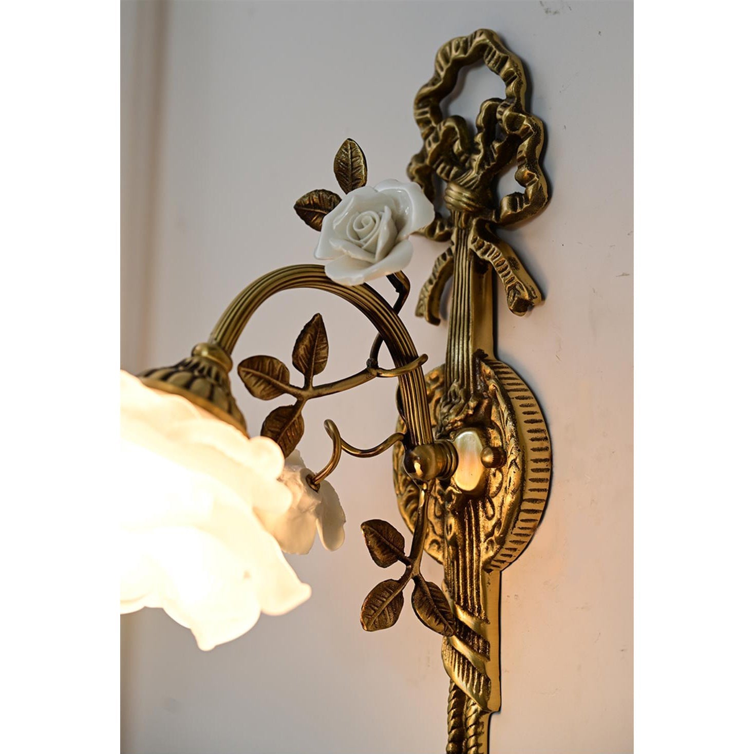 Rosalie Floral Wall Lamp, angled view.