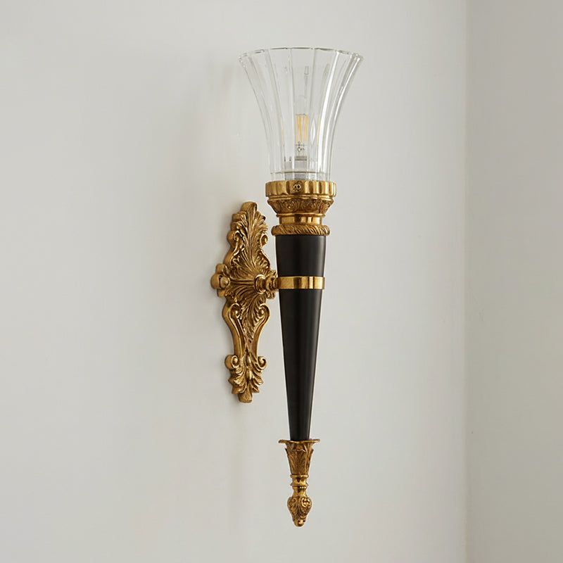 Close-up of the elegant brass fixture details.