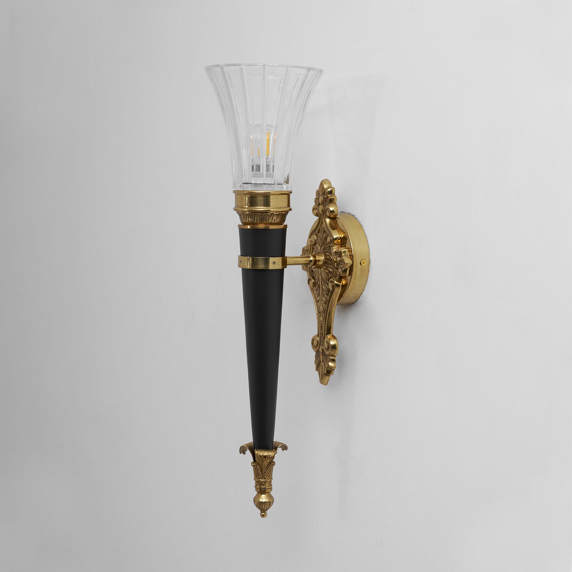 The lamp illuminating a reading nook.