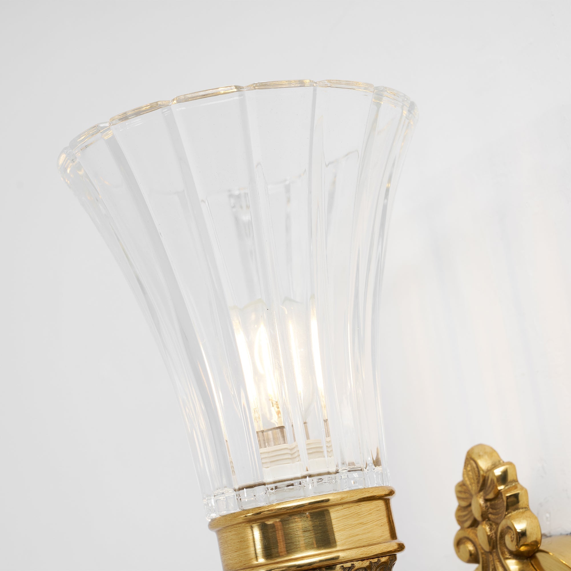 The lamp's reflection in a nearby mirror.