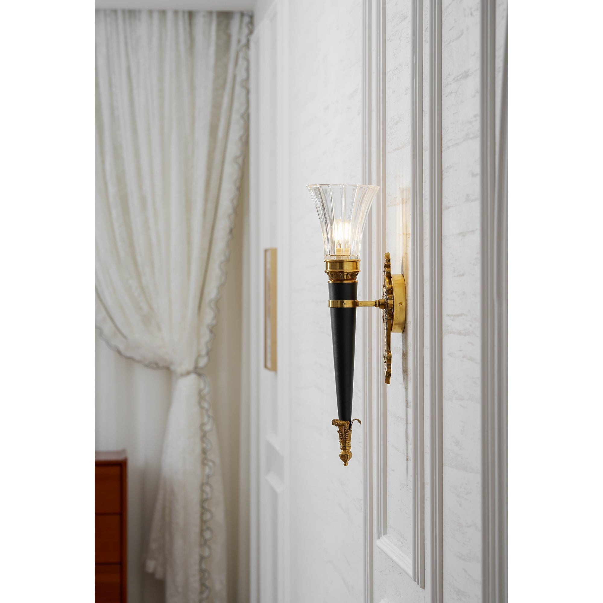Stylized photo of the Rosalinda lamp in a modern interior.