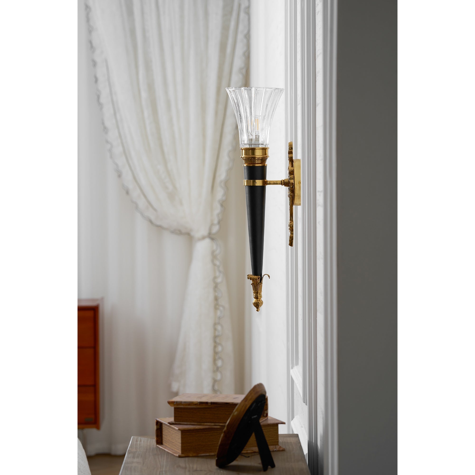 The black color variant of the Rosalinda Torch Wall Lamp.
