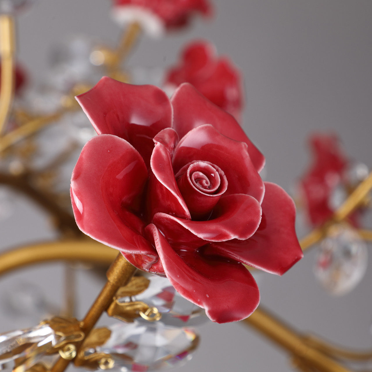 Close-up of the metal lamp body and crystal attachments.