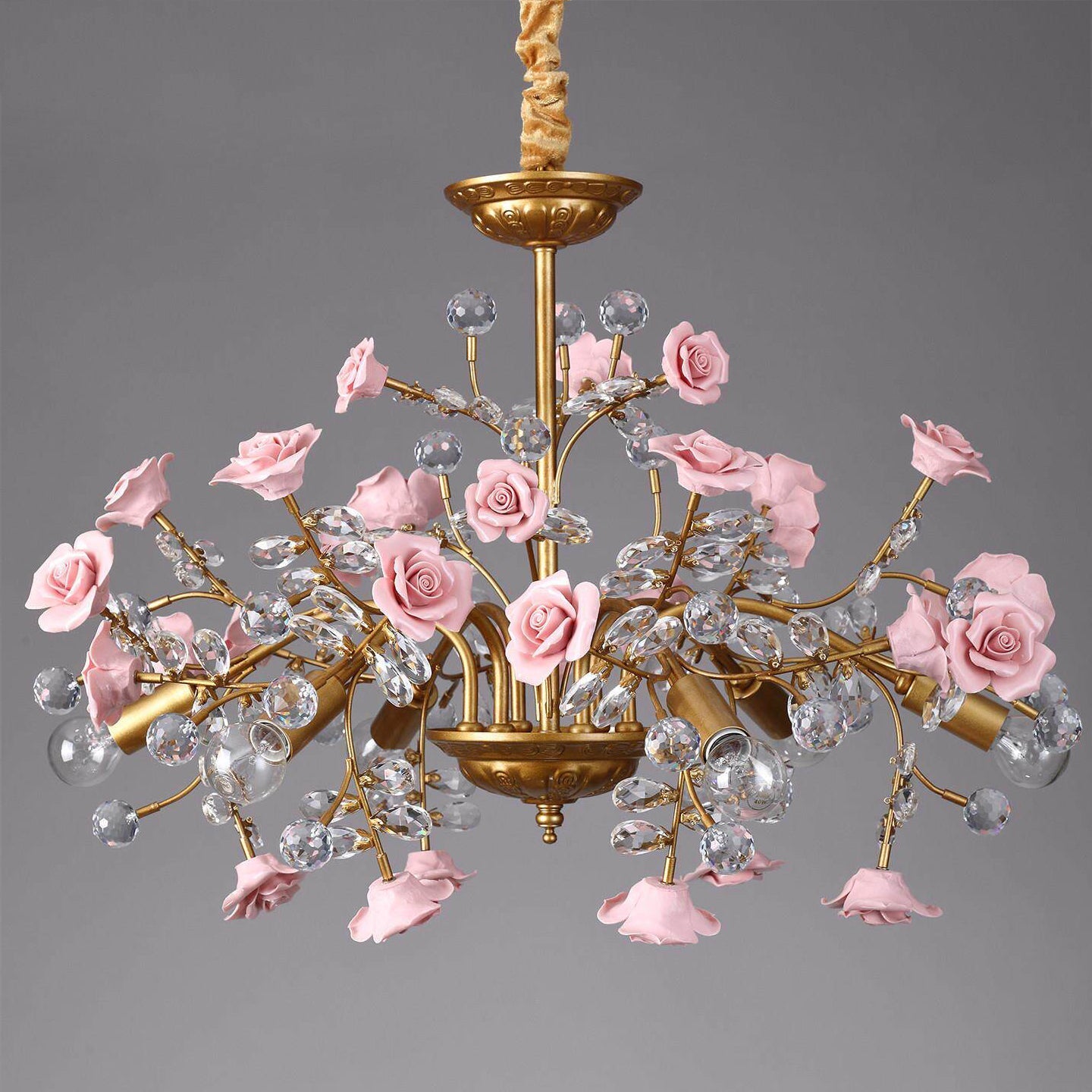 Lifestyle image of the Roseto Chandelier creating a warm ambiance.