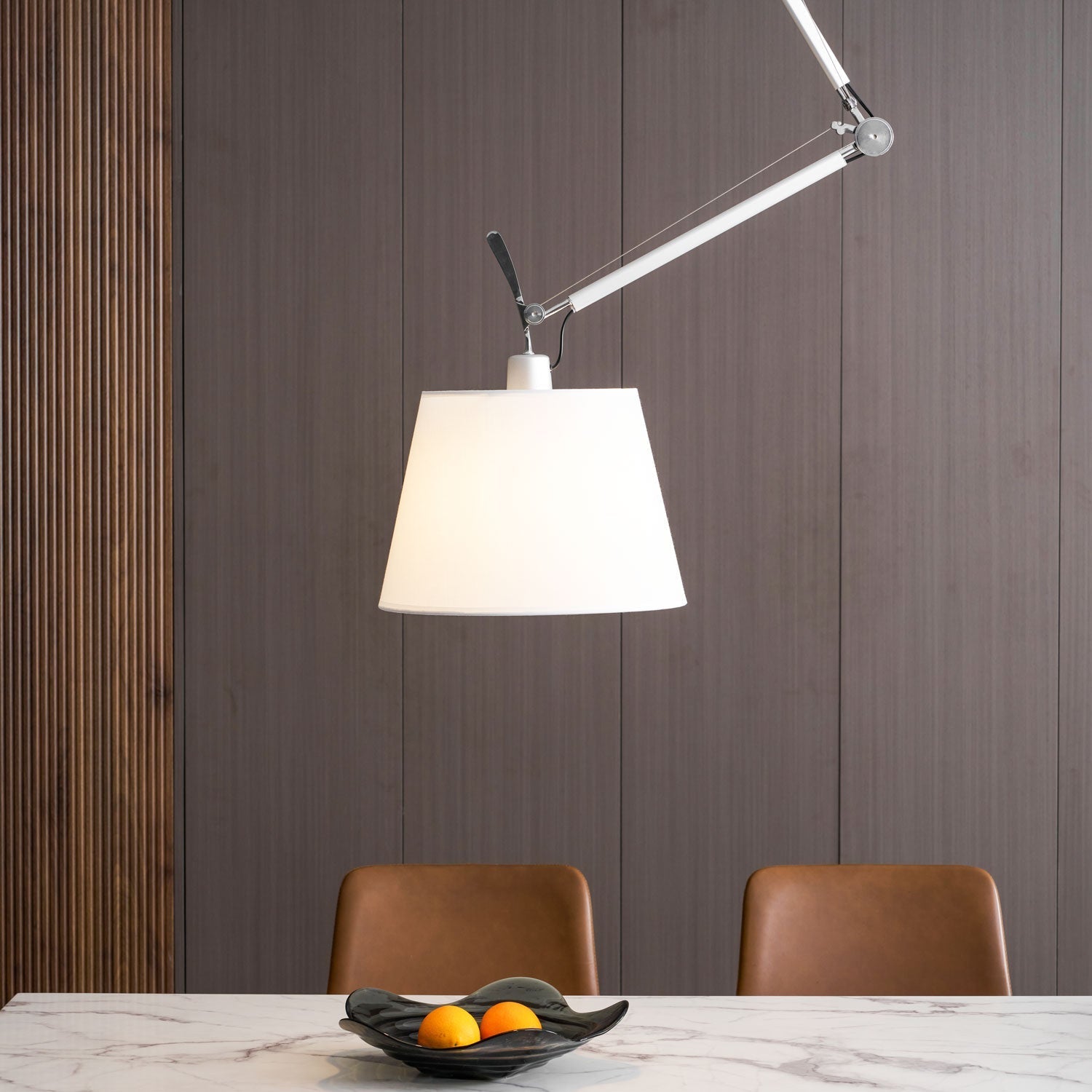 The texture of the parchment shade on the beige lamp.