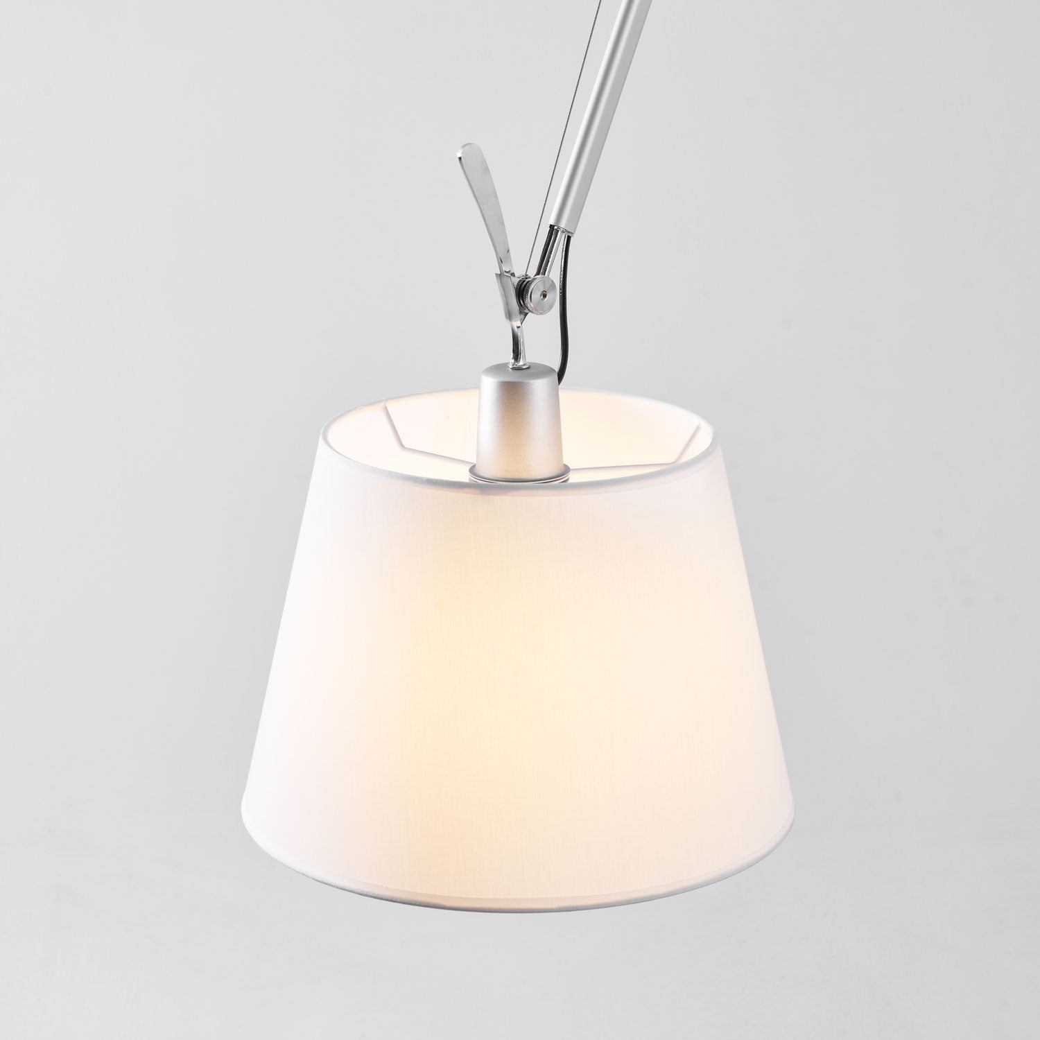 The large beige Costanza lamp in a formal dining room.