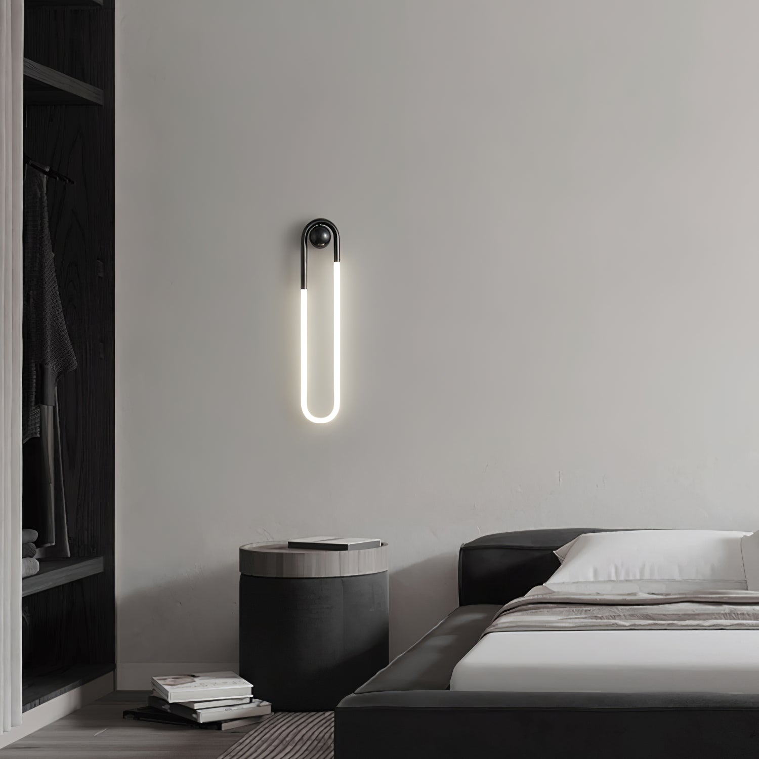 The lamp casting a warm glow on a textured wall.
