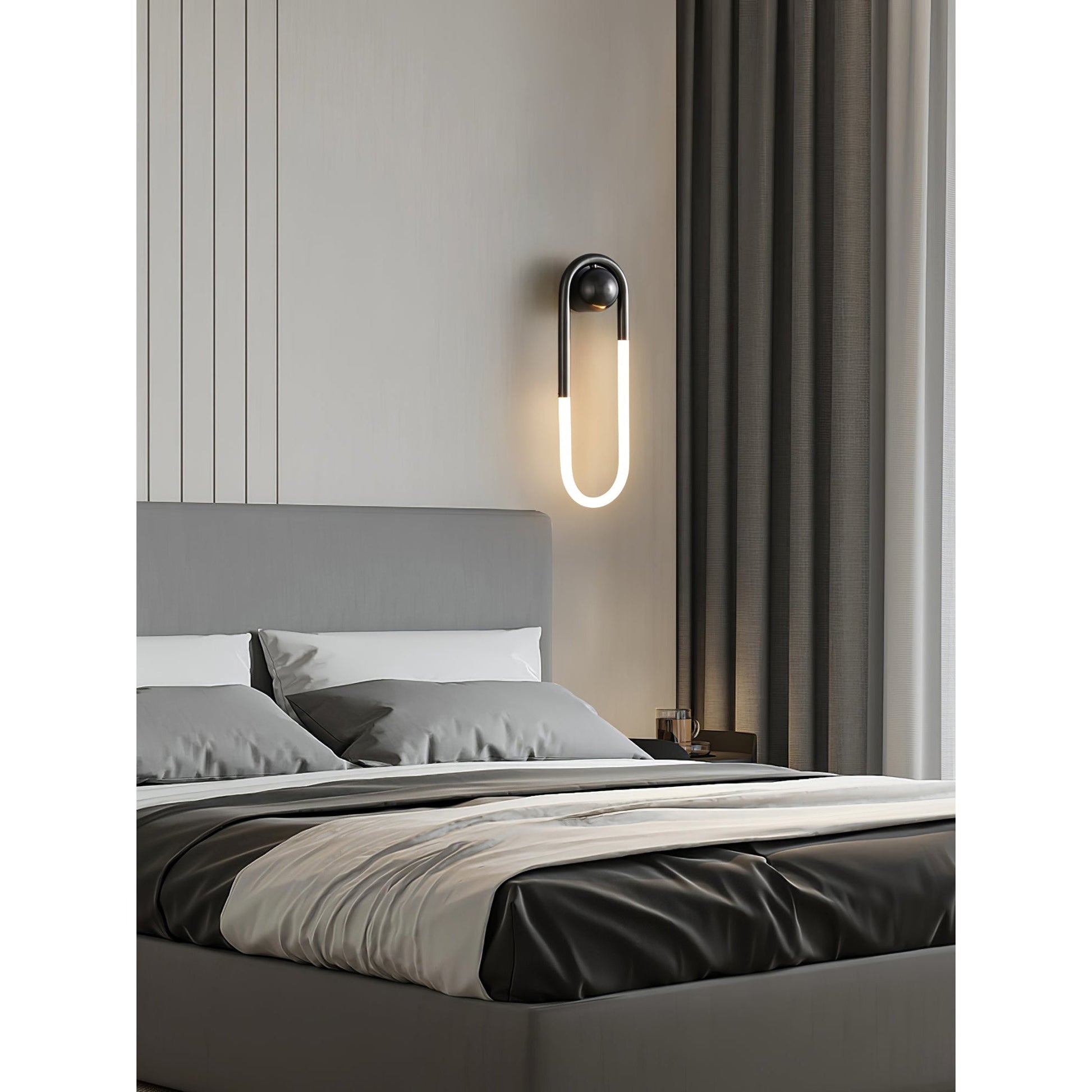 The integrated LED light source of the Rudi Loop Wall Lamp.