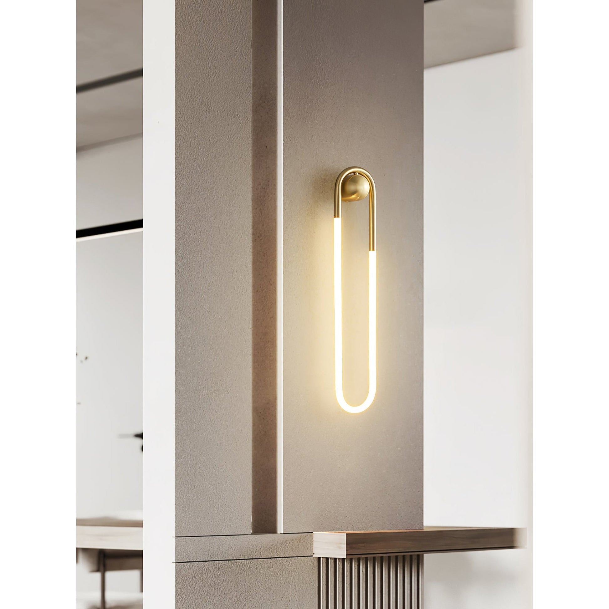 Rudi Loop Wall Lamp in black finish in a modern bedroom.