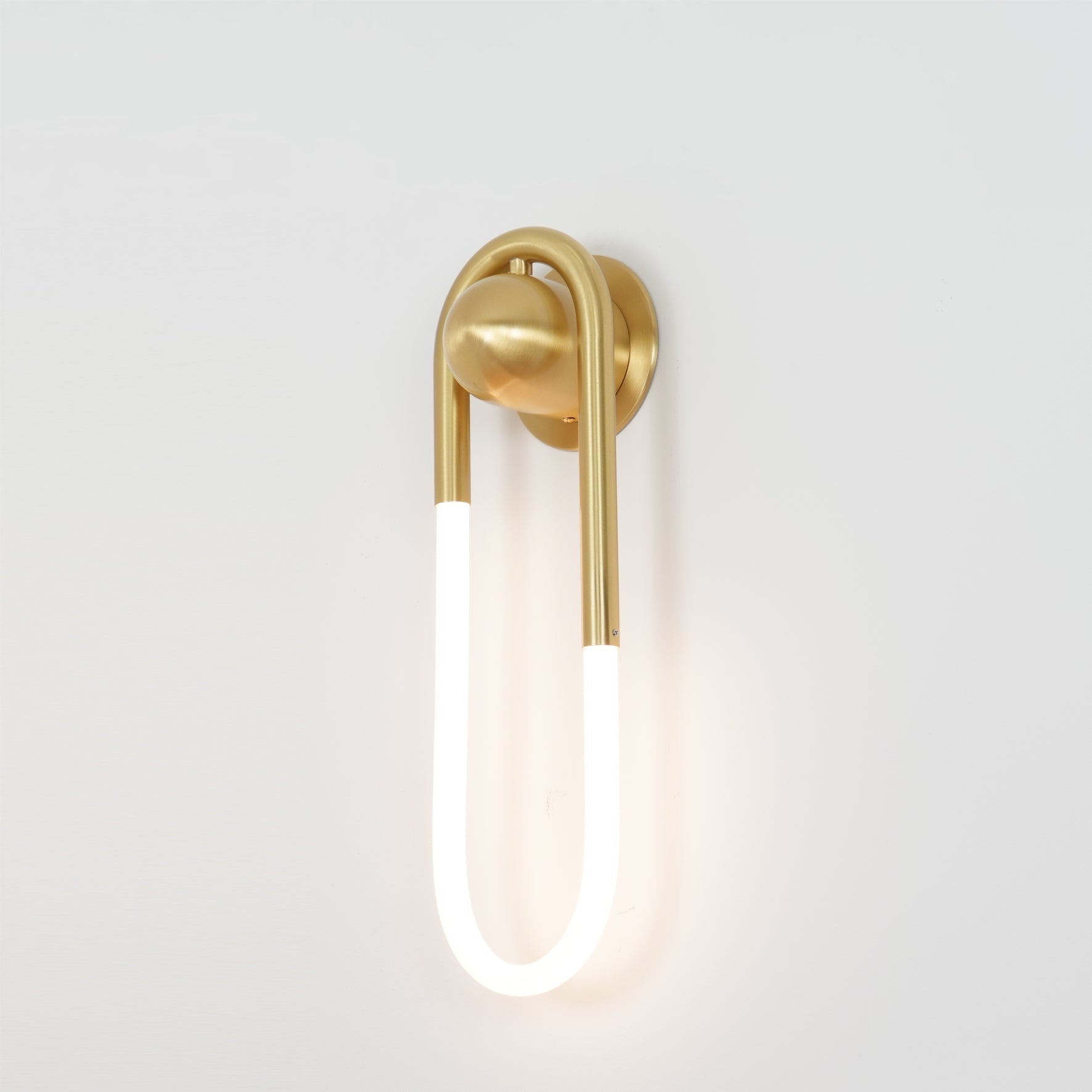 Lifestyle image showing the white lamp in a decorated space.