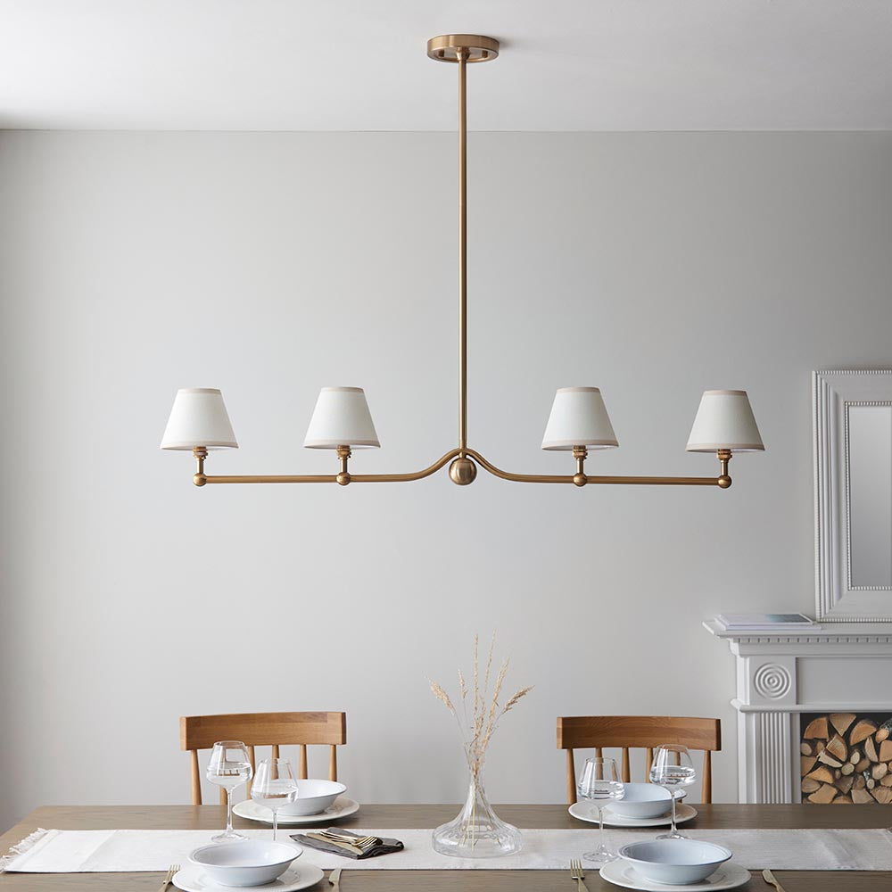 Close-up view of the Santiago Linear Pendant Lamp's brass finish.