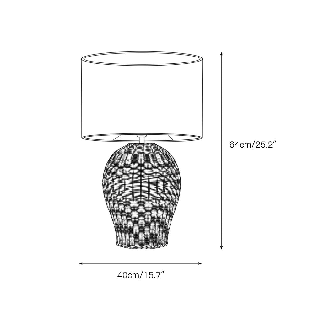 Saona Rattan Table Lamp shown on a living room end table.