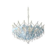 Sasha Capiz Bead Chandelier hanging in a coastal-style dining room.