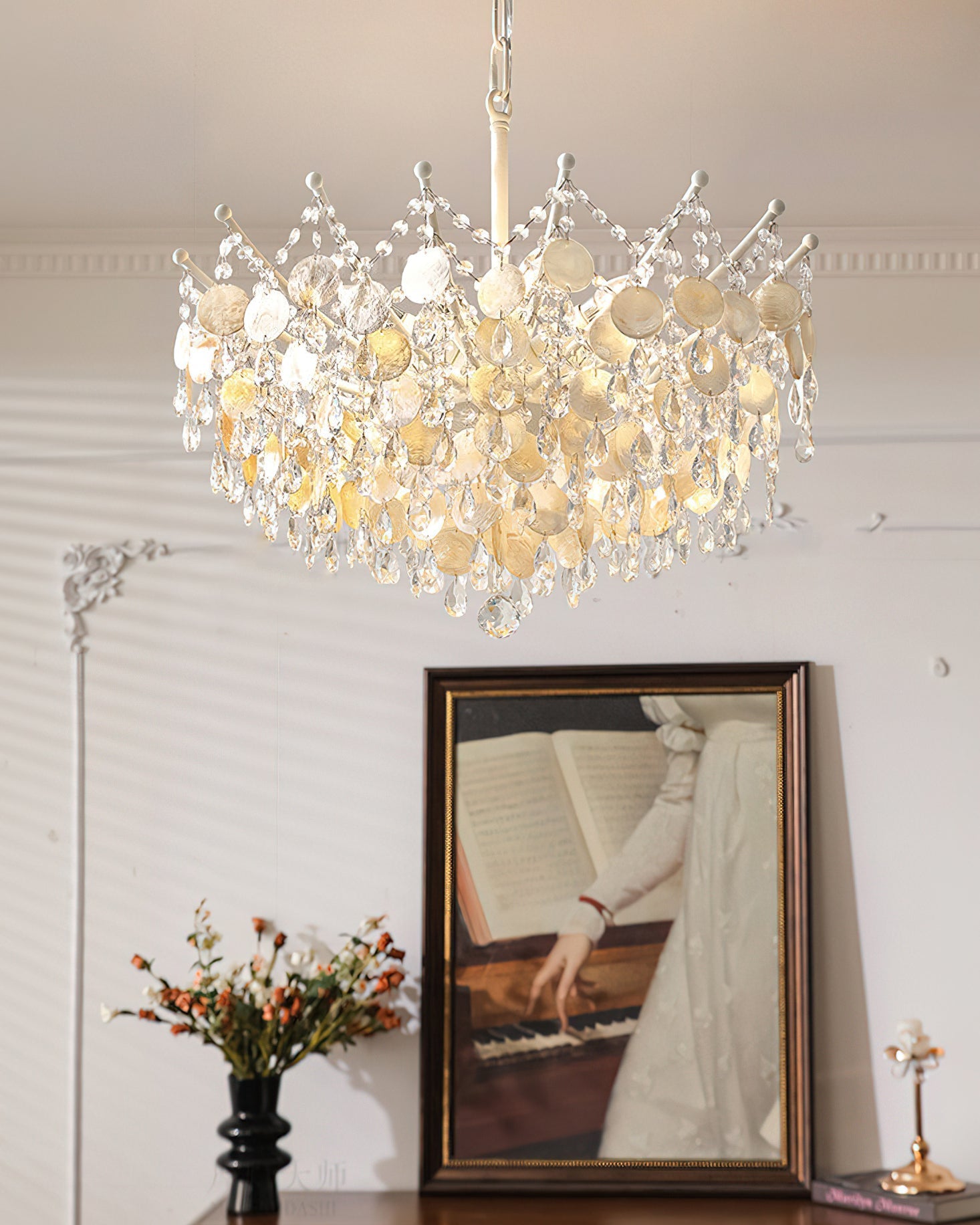 The largest Sasha Chandelier as a statement piece over a grand dining table.