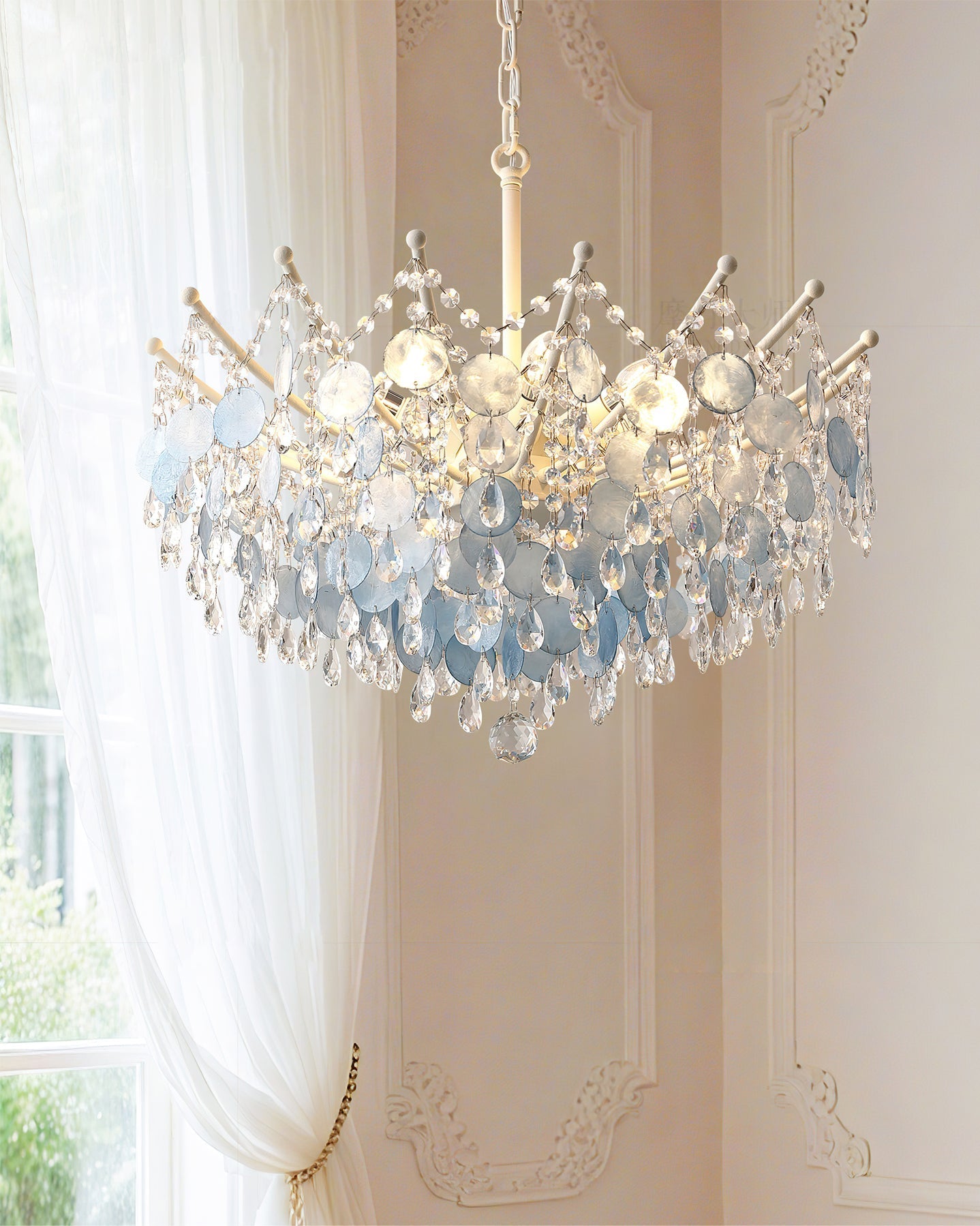 The Sasha Chandelier hanging from its ceiling canopy.