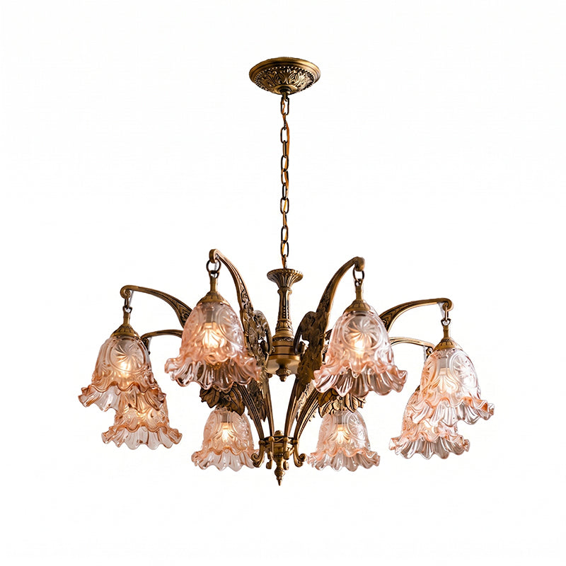 The Savannah Bell Chandelier with amber glass shades for a warmer ambiance.