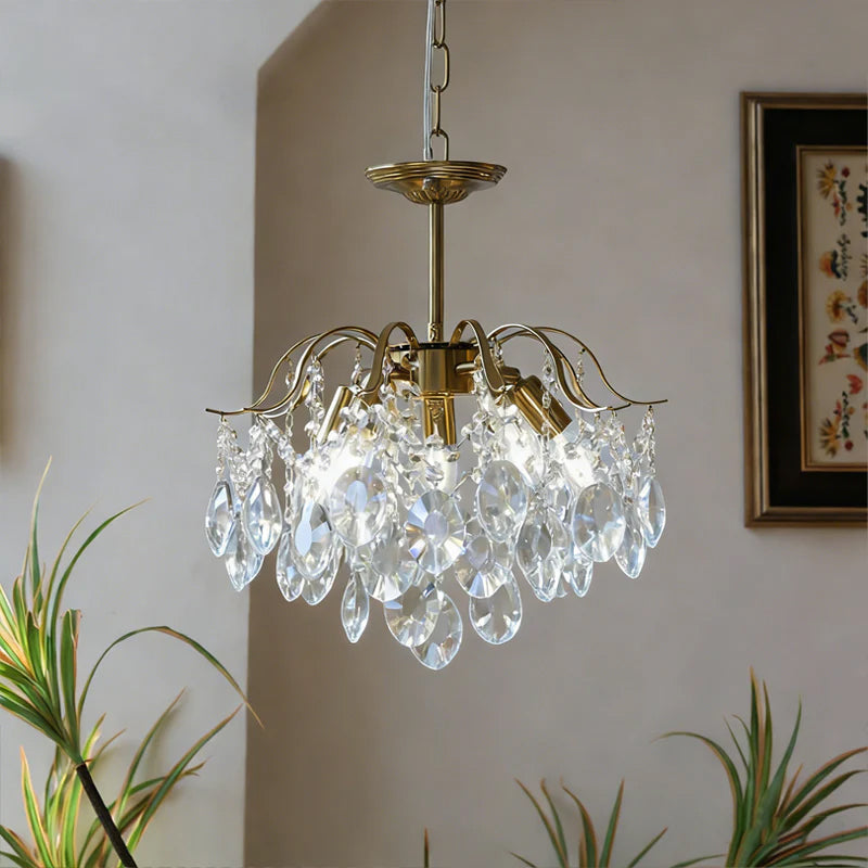 The gold finish of the metal frame on the Sciolari Crystal Chandelier.