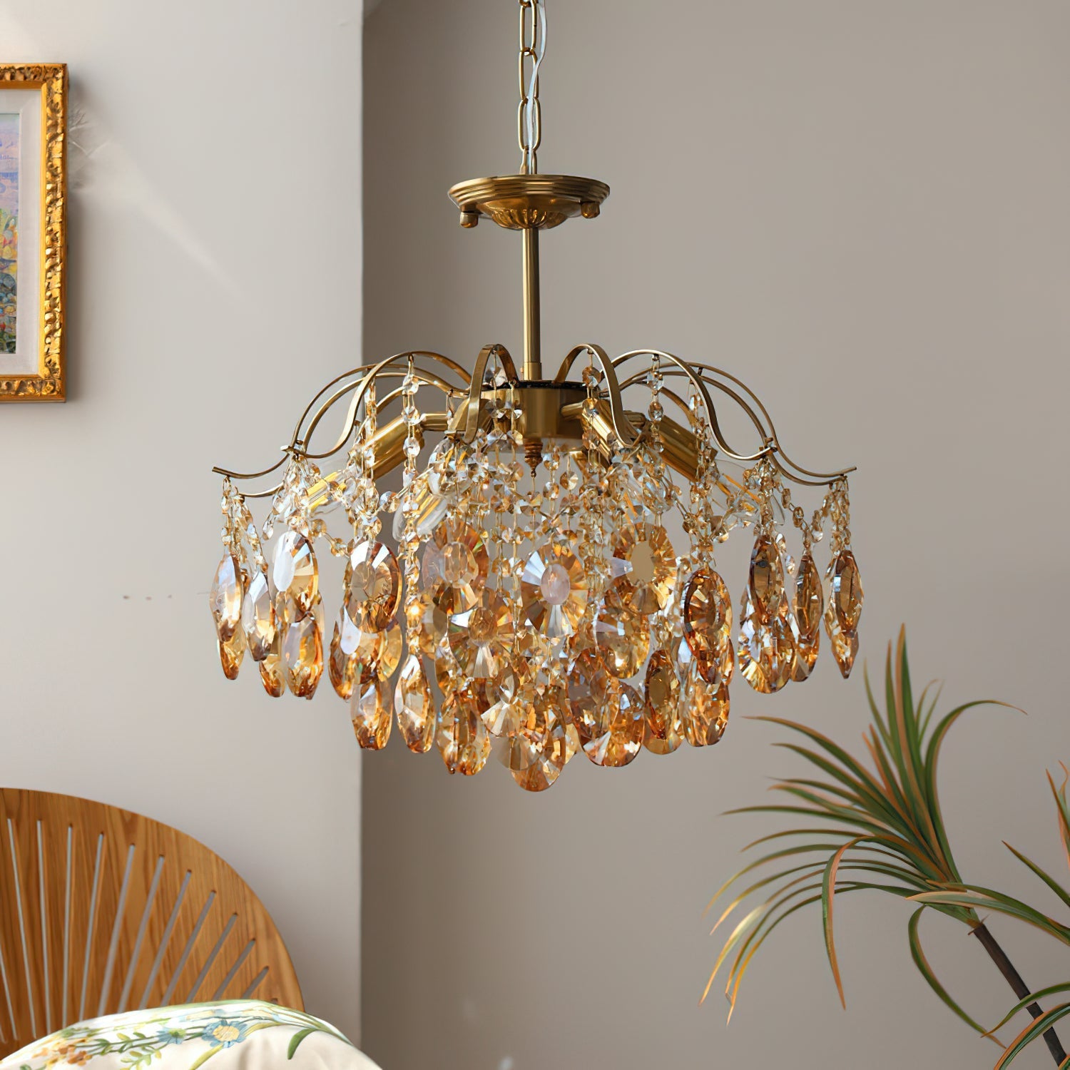 Sciolari Crystal Chandelier with a gold metal frame.