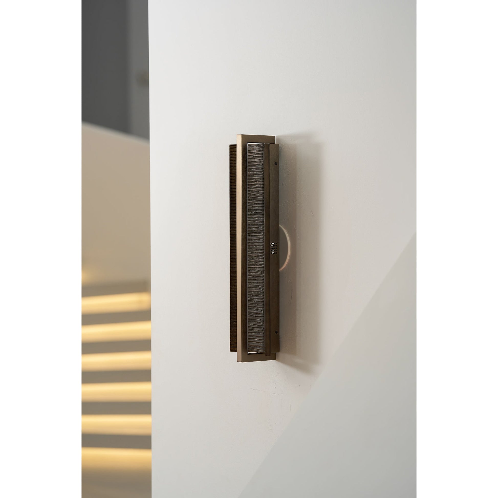 Scorpio Wall Lamp in a dark, moody interior.