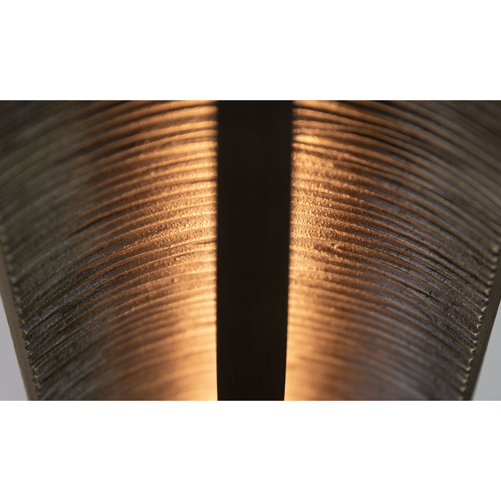 Close-up on the texture of the bronze finish.
