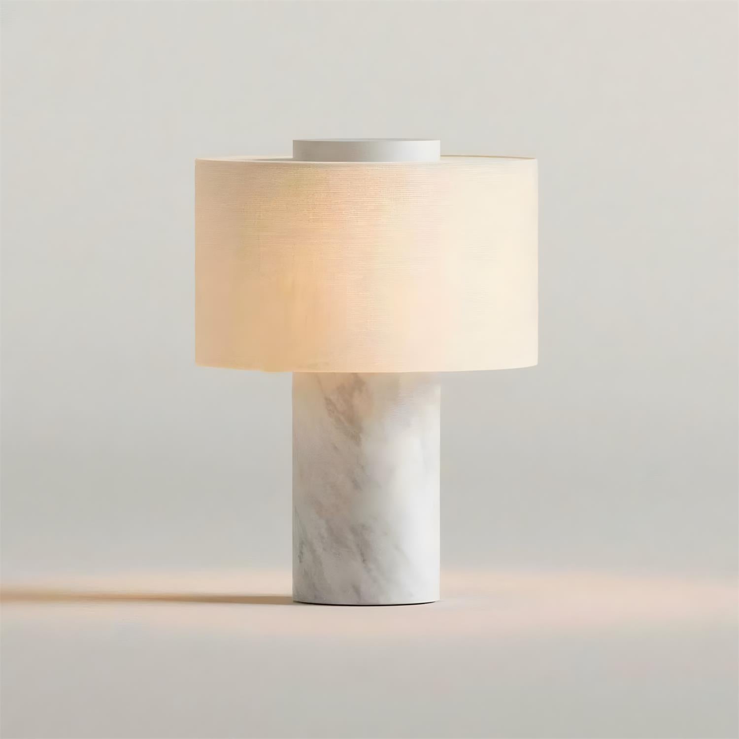 The Sediment Table Lamp placed on a home office desk.