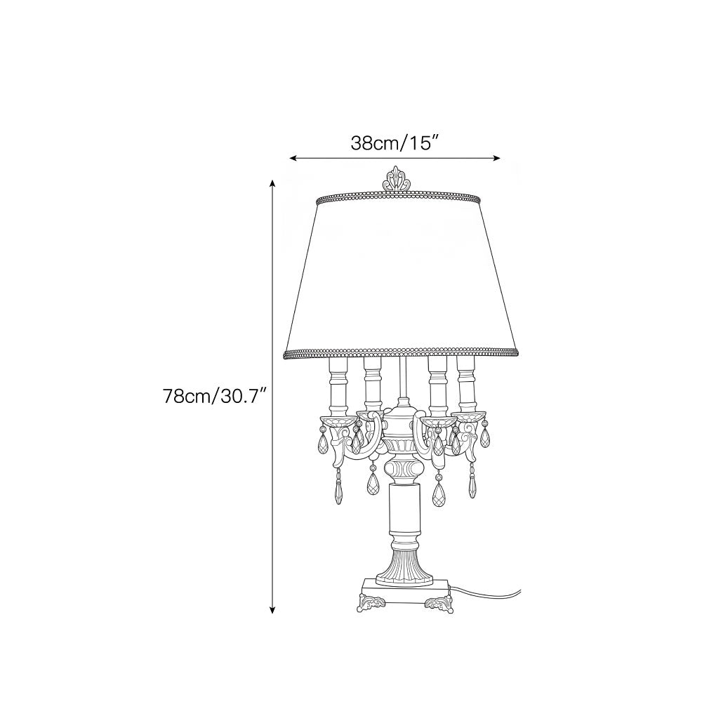 The Sens Table Lamp displayed on a console table in an entryway.