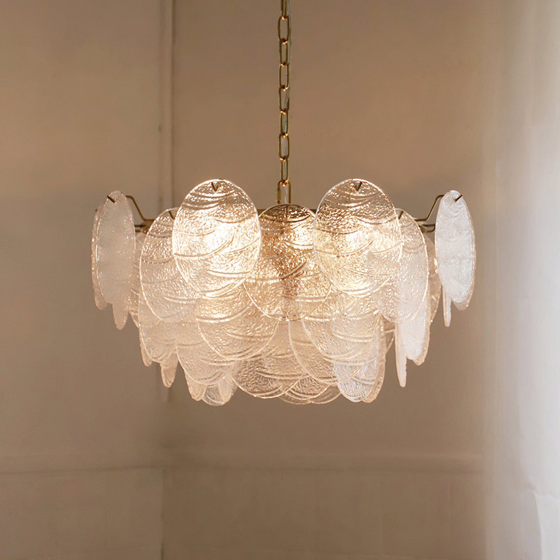 Angled view of the circular Seraphina Halo Chandelier against a neutral wall.