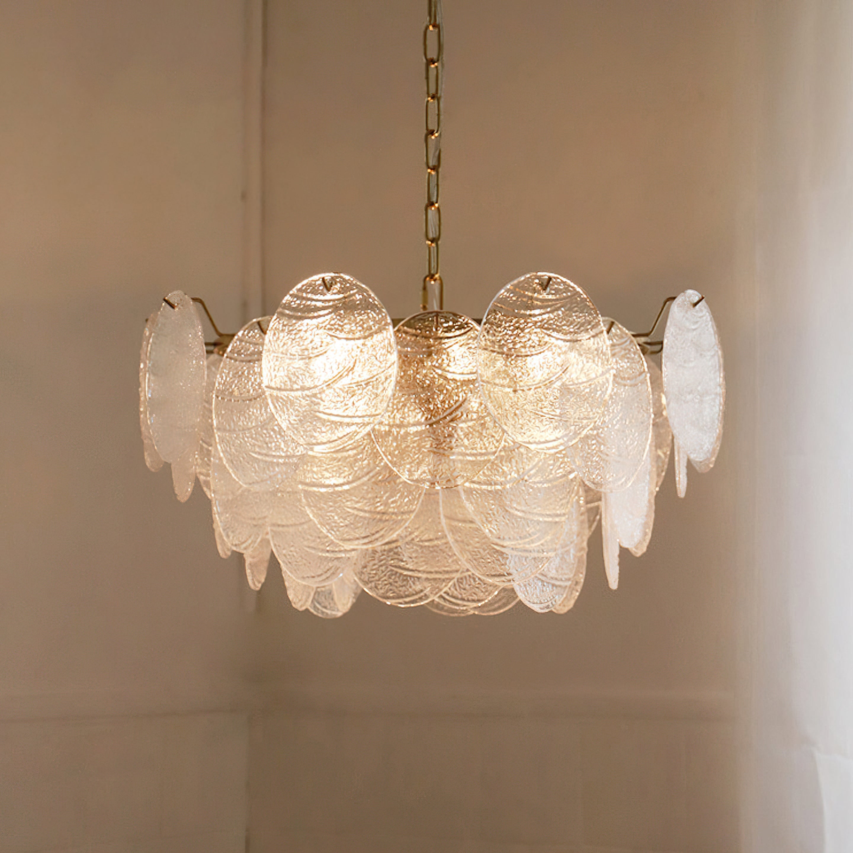 Angled view of the circular Seraphina Halo Chandelier against a neutral wall.