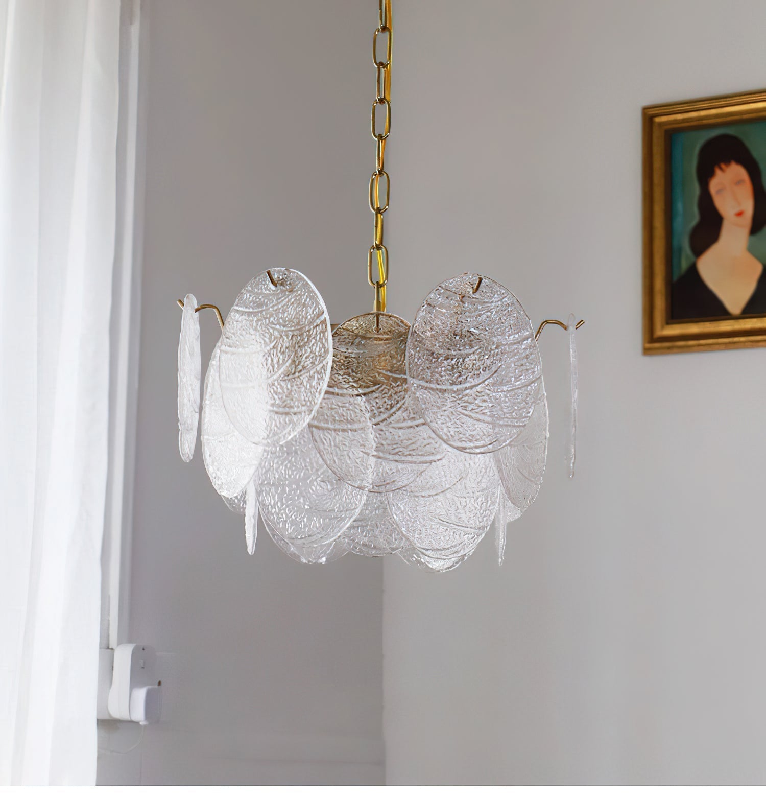 The Seraphina chandelier as a statement piece in a high-ceiling foyer.