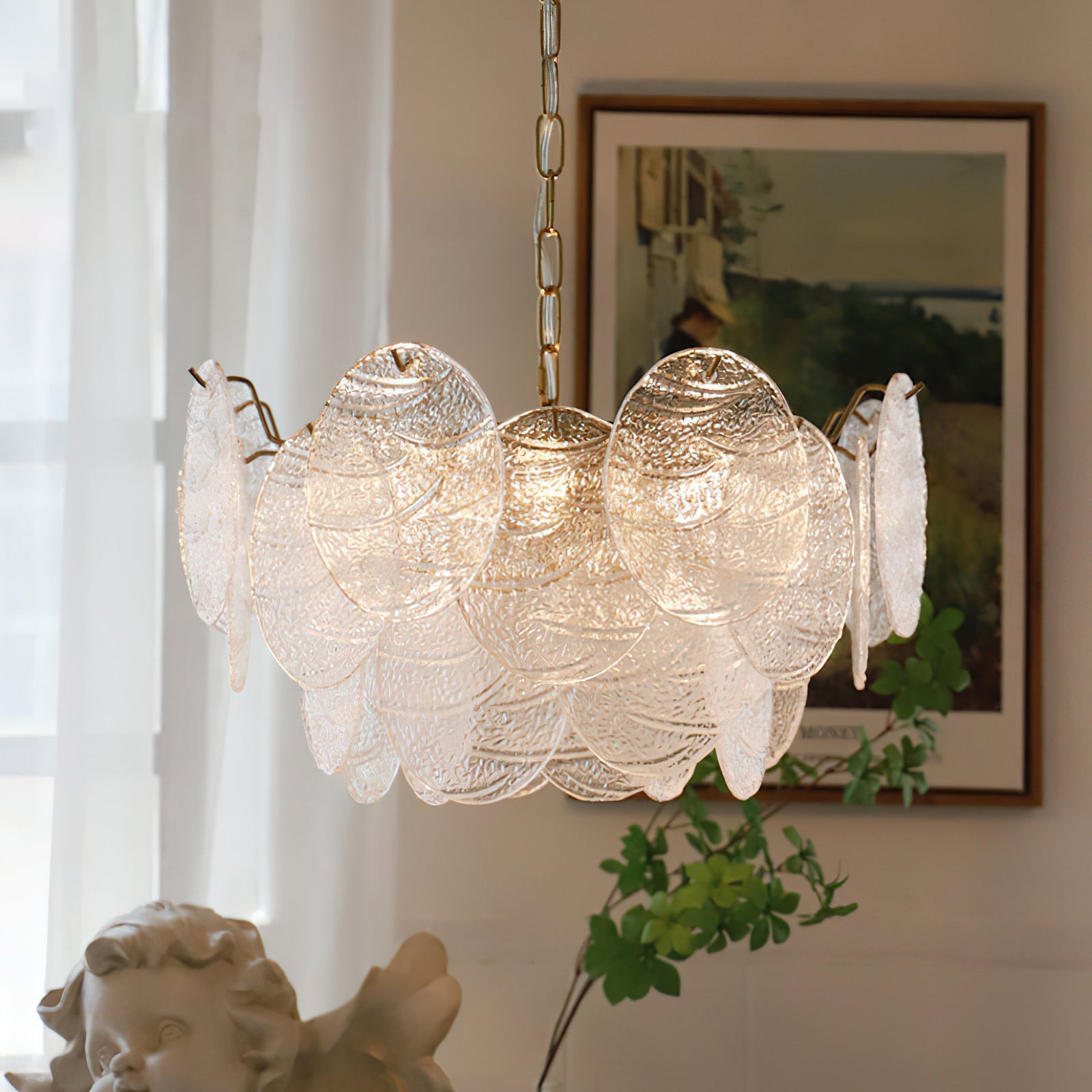Close-up view of the overlapping glass discs on the Seraphina chandelier.
