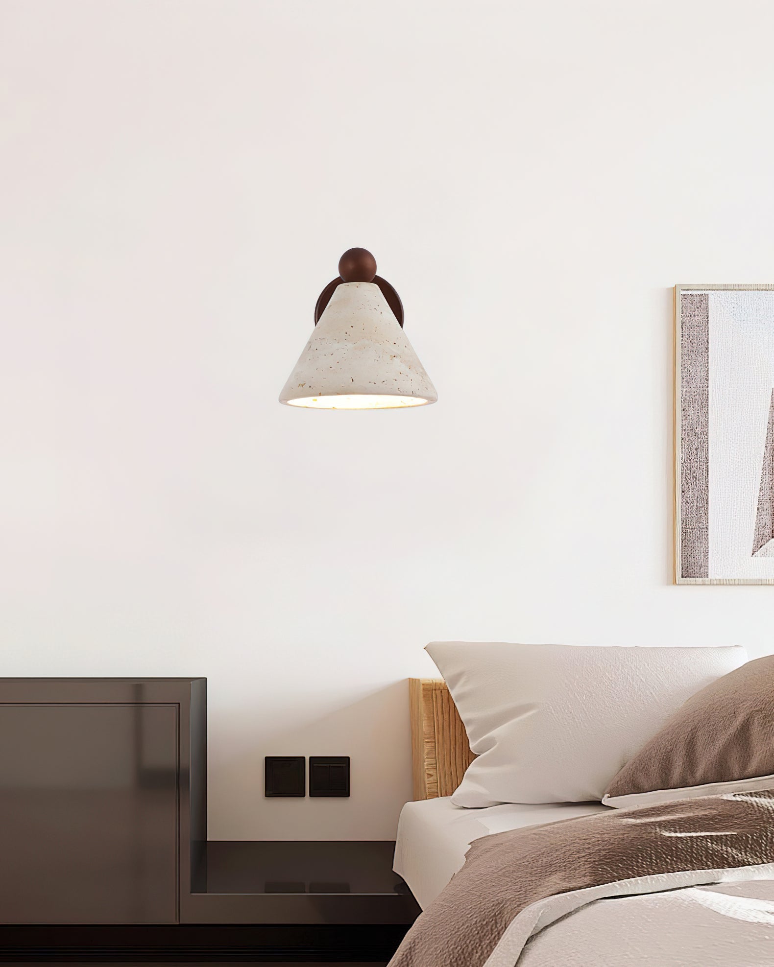 The wall light illuminating a modern hallway with its warm glow.