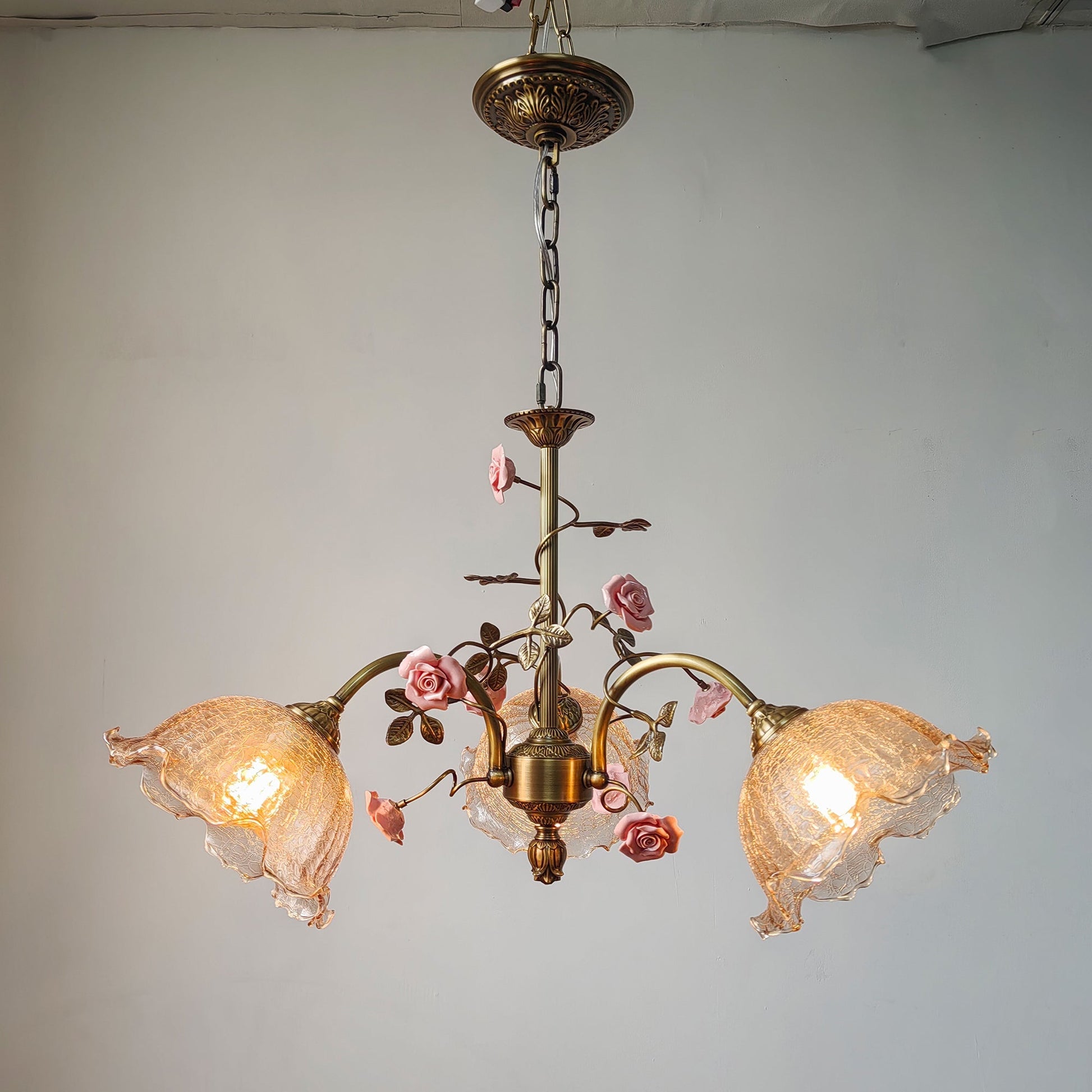 The 3-head version of the Serenade Chandelier against a plain background.