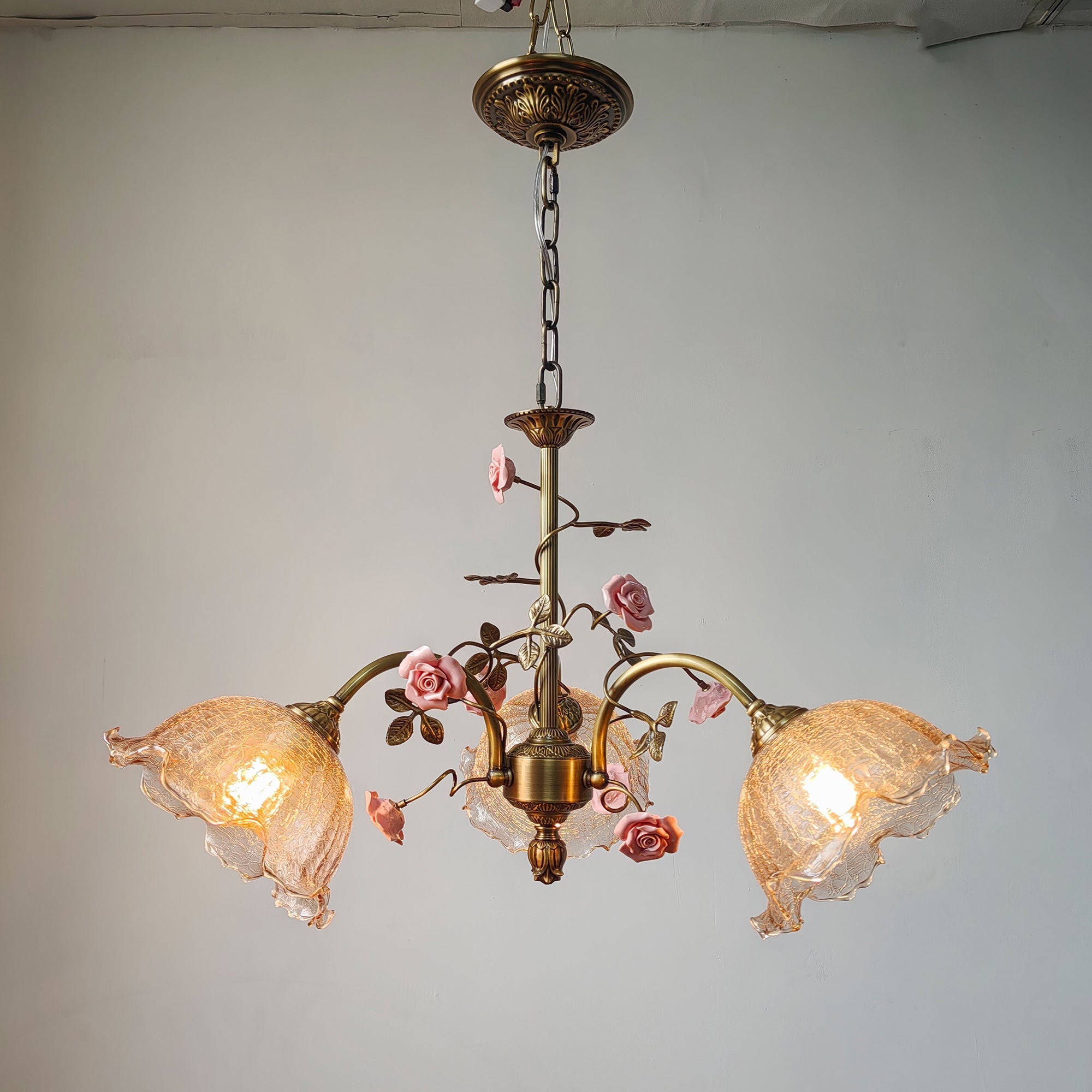 The 3-head version of the Serenade Chandelier against a plain background.