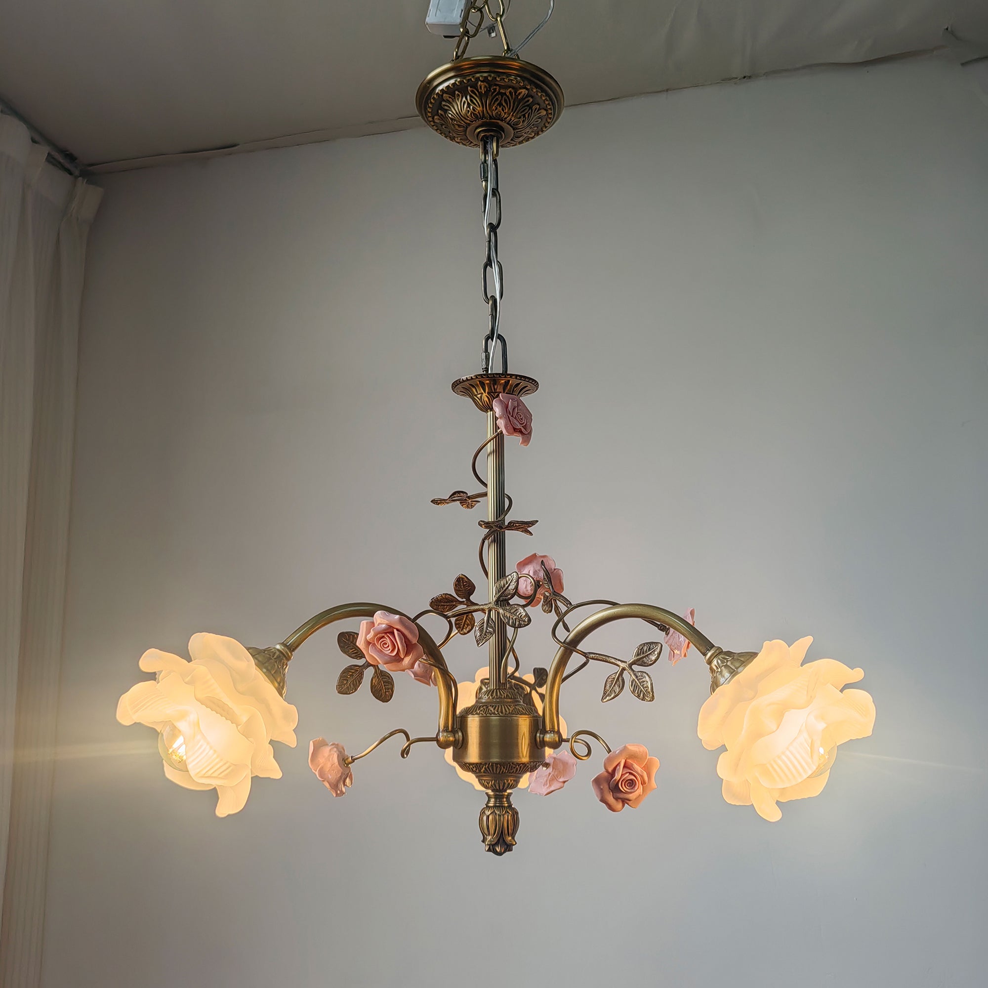 Serenade Chandelier with 6 heads in a modern living room.