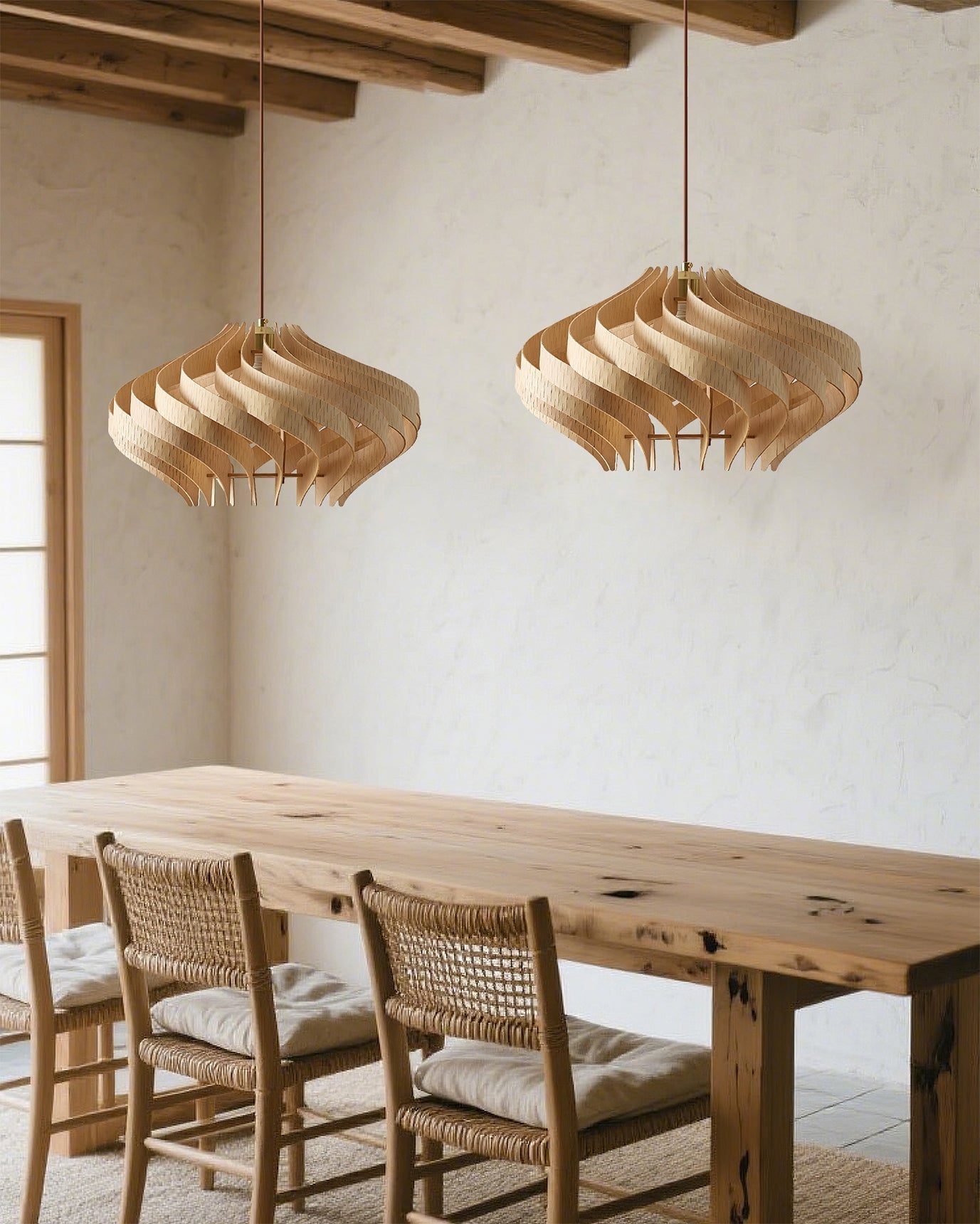 Serentia Pendant Light hanging elegantly over a modern dining table.