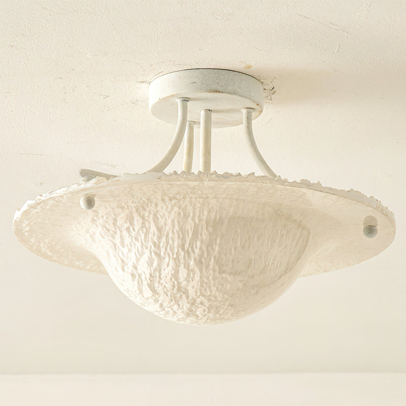 The Serilda Ceiling Light illuminated, casting a warm and inviting glow.