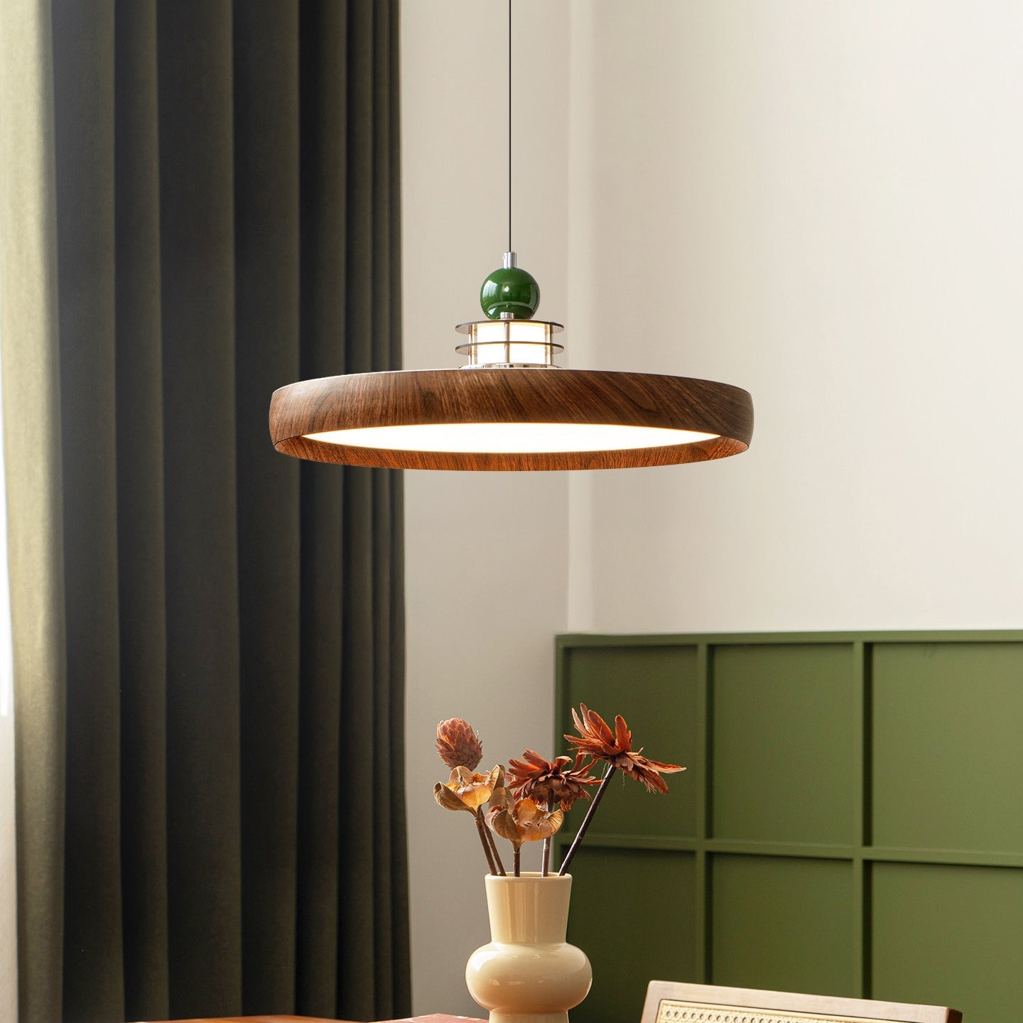 Close-up of the Sia Pendant Light's scalloped metal shade with a wood-grain finish.
