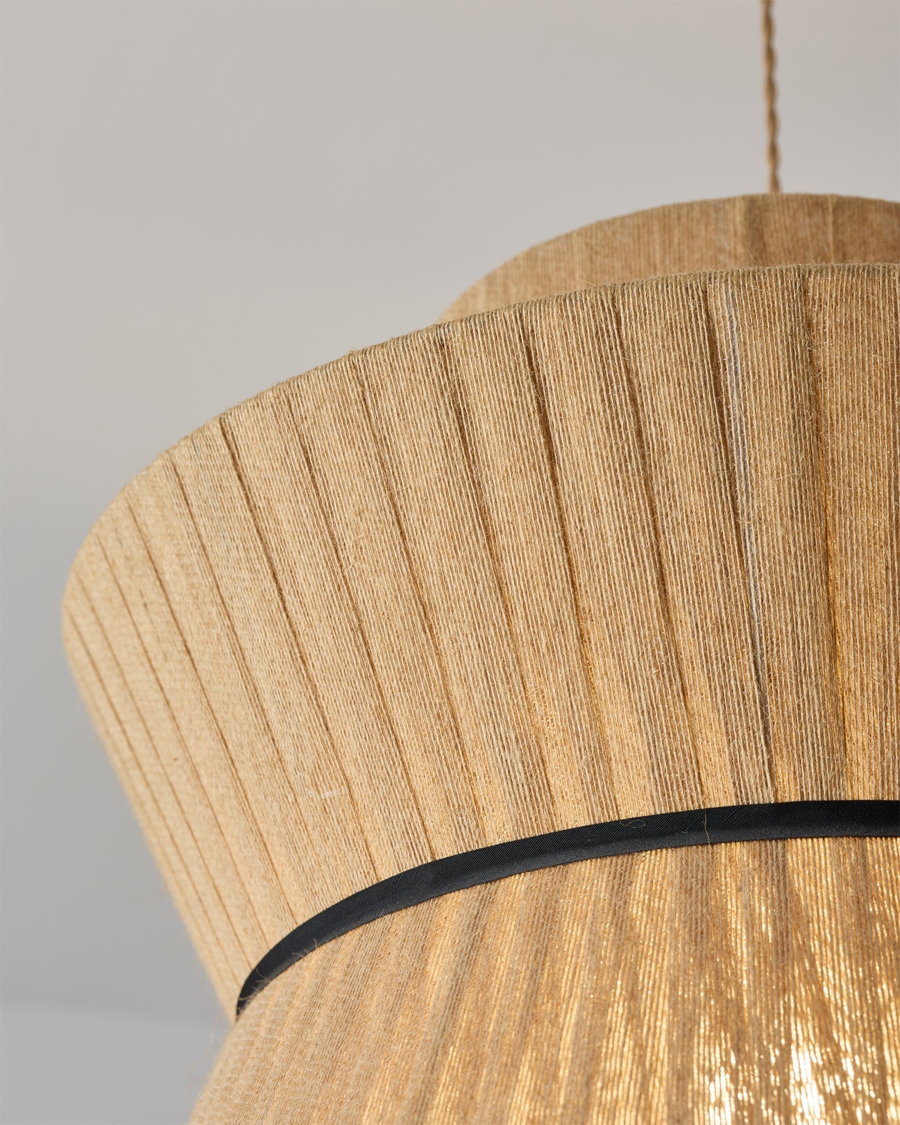 Angled view showcasing the layered and pleated structure of the shade.