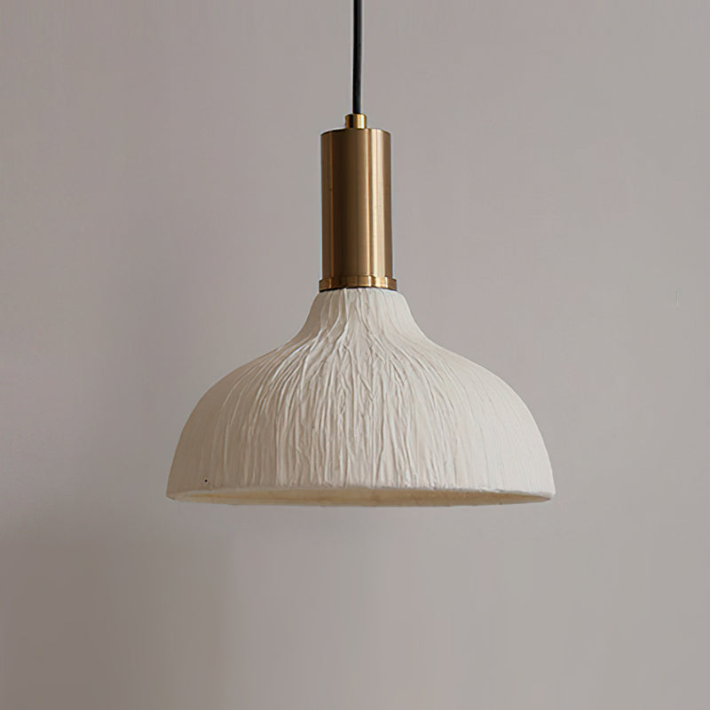 Soft light filtering through the translucent paper of the Siya Pendant.