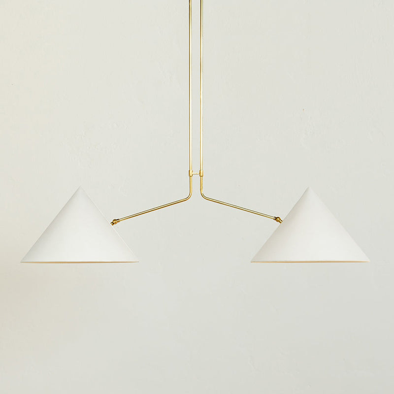 The pendant lamp shown in a living room environment.
