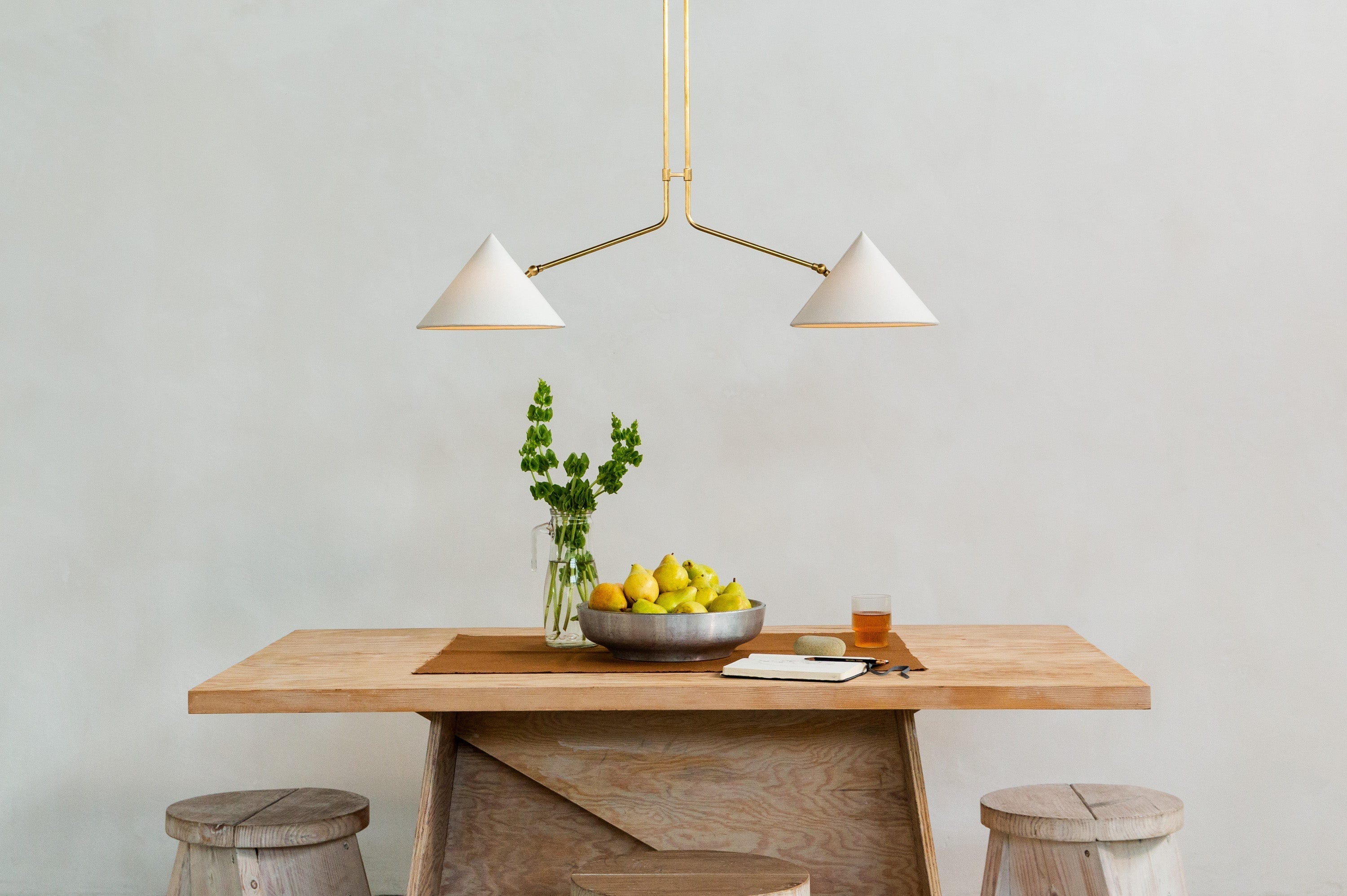 Angled view of the brass Slide 2 Arm Pendant Lamp.