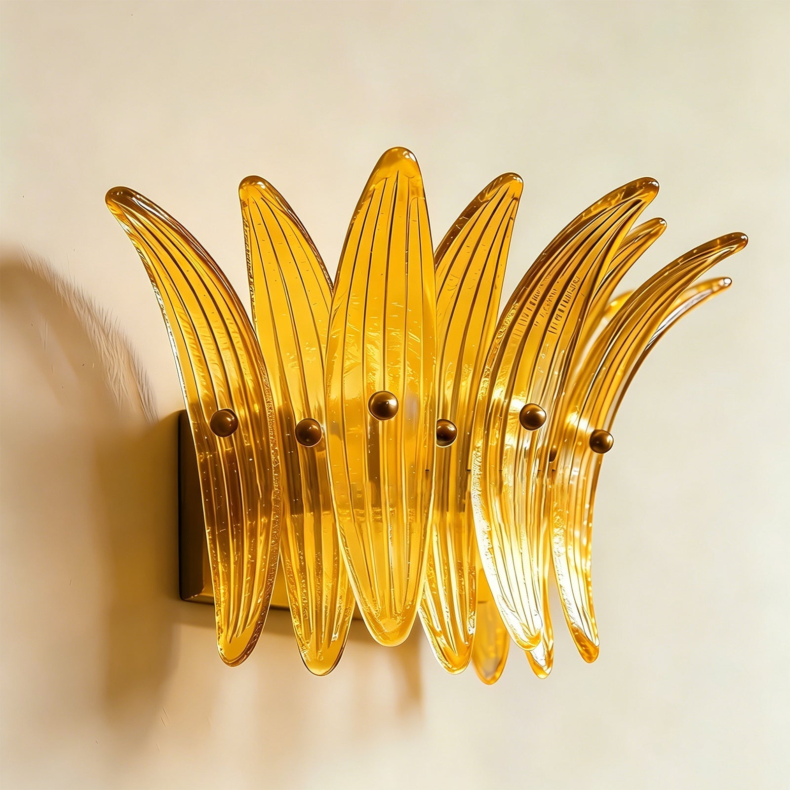 Amber Smeralda Wall Sconce creating a cozy atmosphere in a dimly lit room.
