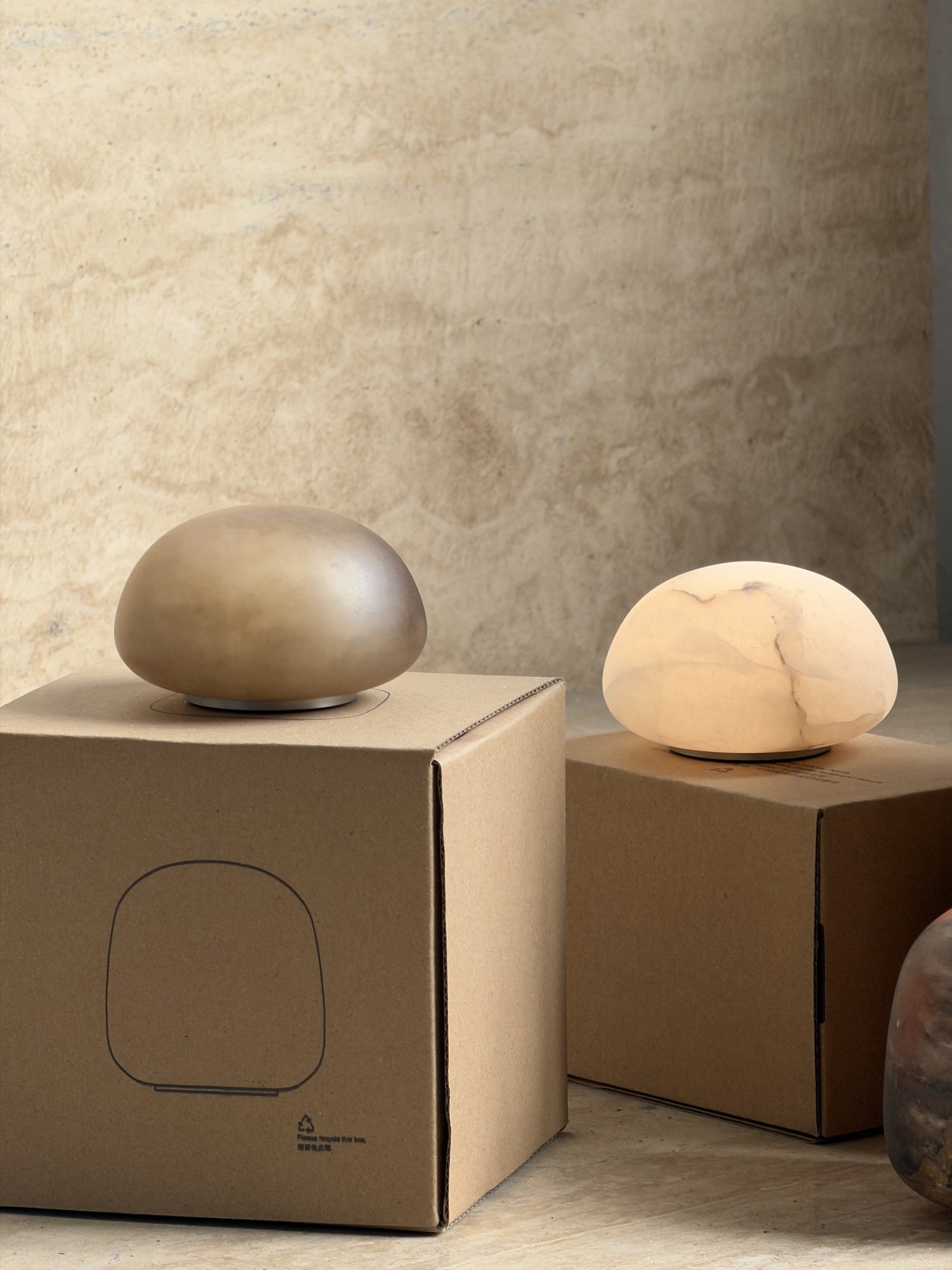 The portable lamp being used as a centerpiece on a small table.