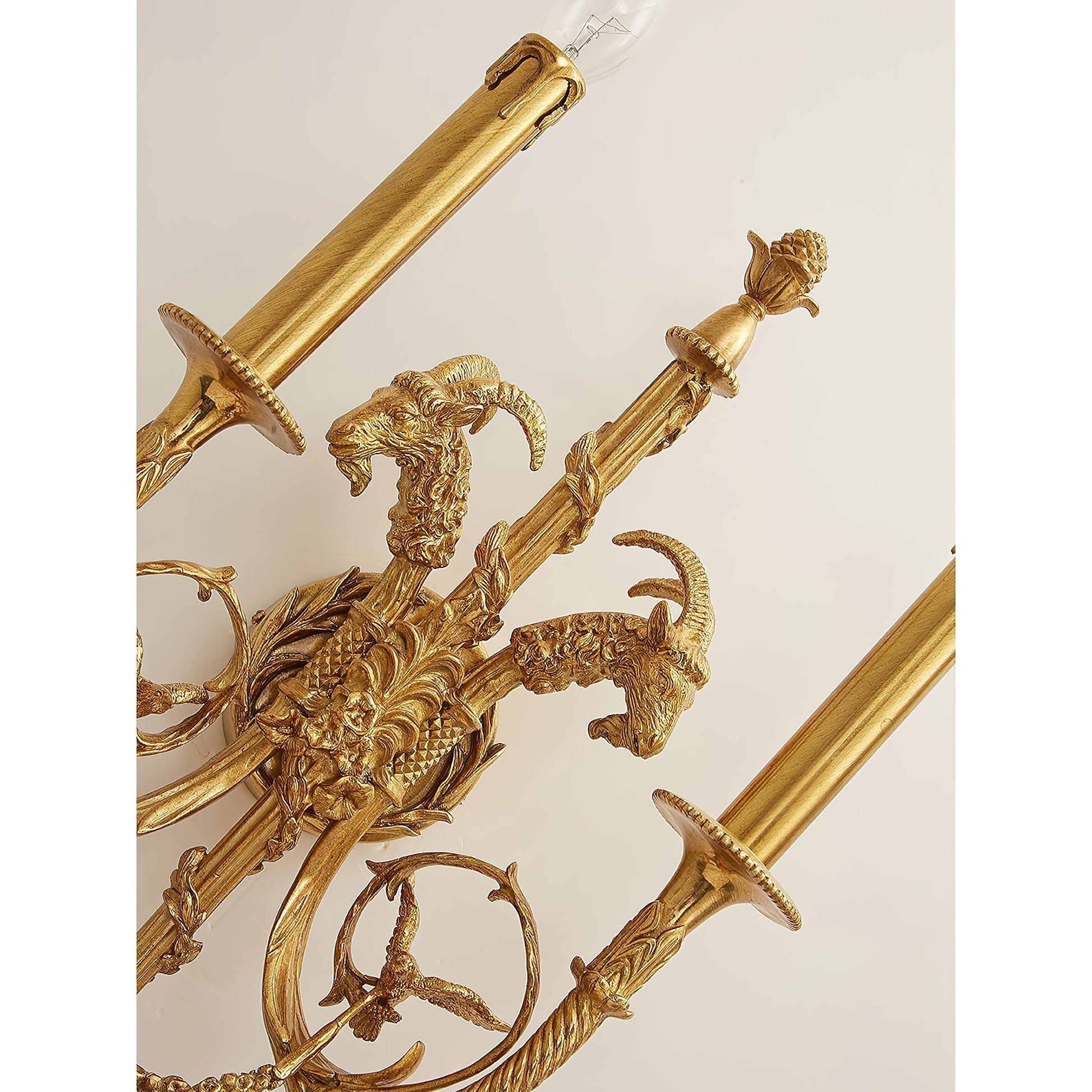 Sociapailis Brass Wall Lamp used as an accent light next to a piece of art.