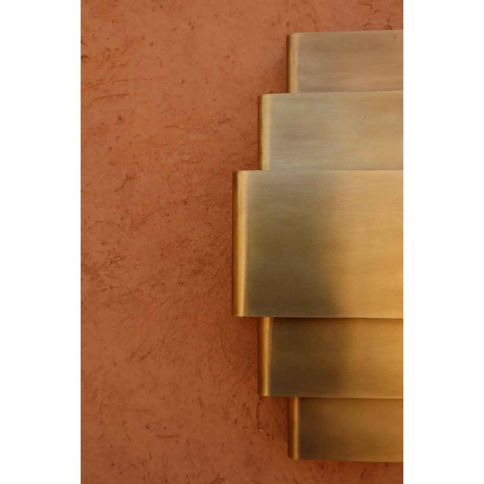 Close-up on the G9 socket of the Sofia Brass Wall Lamp.