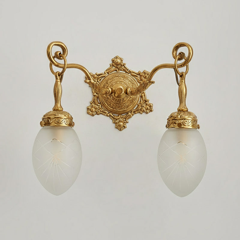 One-head Solange lamp mounted on a light-colored wall.
