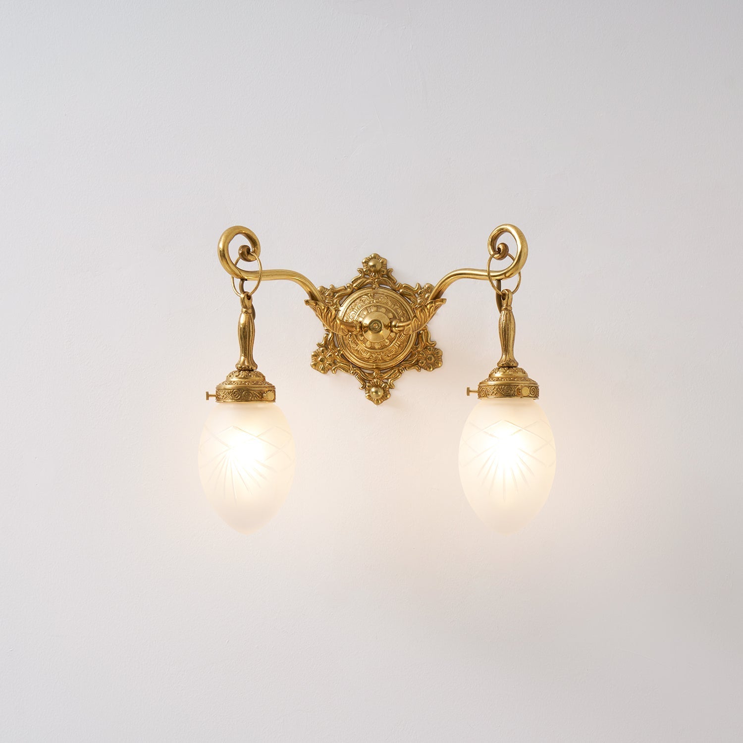 Lifestyle image of the Solange lamp in a bedroom.